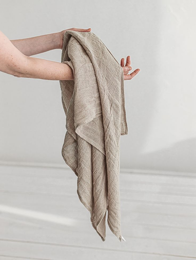 Neutral towel held up in daylight